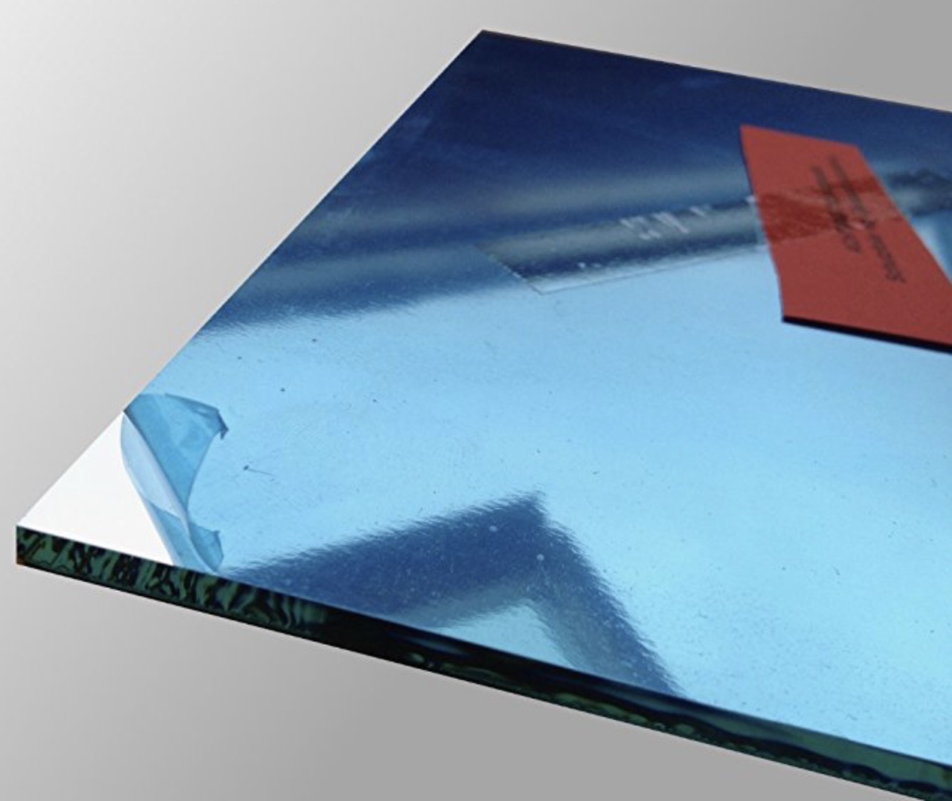 Front-surface mirror with protective film